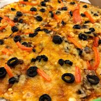 Make your own with mushrooms and olives  at Caprinos Pizza in Newcastle Upon Tyne