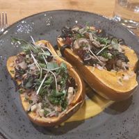 Stuffed squash with rice, pumpkin seeds, mushrooms and cranberries at Catalyst Restaurant in Cambridge