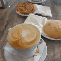 Vegan cappuccino and vegan biscuits at Caffe' Pascucci St. Venera in Santa Venera