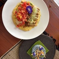 Creamy Pumpkin base with tofu and tempeh marinated in lightly spiced coconut milk. Blue rice!  at Be GILI MOOD in 