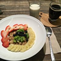 Mixed fruit with vanilla and granola (and a black americano) - great breakfast  at Veganerie - Mercury Ville in Bangkok
