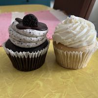 Oreo cupcake and white cake with raspberry filling.  at The West Side Bakery in Akron