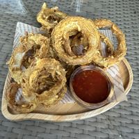 Onion rings with sweet chili sauce  at Lovegan Cafe in Moalboal