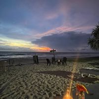 Flowers and candles for a nice atmosphere  at Green Cafe  in Hikkaduwa