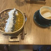 Super heerlijk ontbijt met cappuccino op. Uitgebreide menukaart. Moeilijk om een keuze te maken.   at iVegan Supershop Hoi An - Healthy Plant Based Cafe in Hoi An