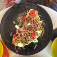 Toasted sourdough with avocado, vegan feta, raspberries and pumpkin seeds  at Coffee Woolston in Southampton