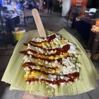 Elote tradicional con mayonesa, salsa, sal con mantequilla y limón   at Maiz Yum Kaax in Monterrey