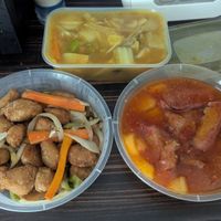 Salt and pepper vegan chicken (bottom left), mixed vegetable curry (top) and roast pork in Thai sauce (bottom right) at The Pagoda in Caerphilly