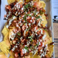 Al pastor nachos on Tuesday special (half off) at Juan More Taco  in Richmond