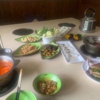 Tomato broth Hotpot + fresh veggies at One Leaf, One World - Ya'an 一叶一世界藏茶素火锅 - 雅安店 in Yaan