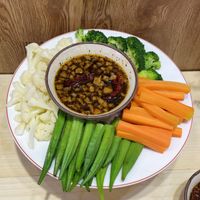 vegetables dipped in traditional Vietnamese dipping sauce  at Om Vegan - Ve Day An Chay in Da Nang