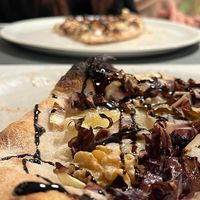 cacio e pepe vegan, noci, radicchio e glassa di aceto balsamico   at Languorino in Cesena