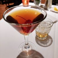 Rye Manhattan with shaker of (dirty) ice on the side, thank you! $2 off for Happy Hour. at General Warren in Malvern