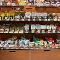 A shelf full of curries and ramen at Kodama Natural Foods RIVERAIN MALL in Fukuoka