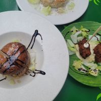 Mushrooms stuffed with orange tartar and vegetable bocadito at MALQUERER in Sevilla