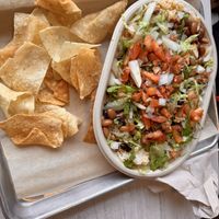 Vegan Tofu Burrito Bowl with no cheese   at Moe's Southwest Grill in Niagara Falls