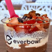 Build a bowl with vanilla, cacao wow, chia pudding, cacao nibs, dates, bananas and berries  at Everbowl in Valdosta