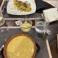 Pasta patate e provola e spaghetti al sapore di mare  at Arrecrià Bistrot in Naples