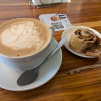 Soy latte and cinnamon roll at Nordico Coffee House in Tamarindo