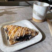 Turnover and coffee  at Cutbow Coffee in Albuquerque