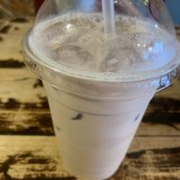 Iced oat milk latte with caramel syrup  at Java Coffee Shop in Keswick