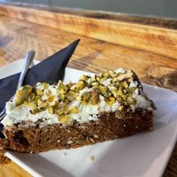 Delicious carrot cake! All very clearly labelled and lots of good tunes too.  at Java Coffee Shop in Keswick