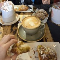 Almond croissant, pistachio croissant, hazelnut pain au chocolat, Coffee and hot chocolate with cream, all vegan! at Java Coffee Shop in Keswick