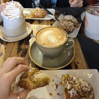 Almond croissant, pistachio croissant, hazelnut pain au chocolat, Coffee and hot chocolate with cream, all vegan! at Java Coffee Shop in Keswick