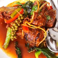 Catfish Eggplant: Battered eggplant wiht red curry paste, bell peppers, young pepper corn and Thai basil at Satdha Plant Based Thai Kitchen in Santa Monica