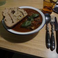 Tomato soup with mushroom meat ball and other fried/sauteed veggies, it’s delicious! Costs 17000 won (10,8€)  at URT 유알티 in Seoul