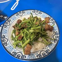 Pork belly and morning glory on rice  at Lee Jae Vegetarian Food in Bangkok