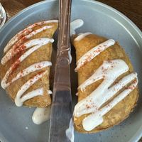 Samosas that were almost empanadas; spicy with a hint of sweet  at Norah - Alberta in Portland