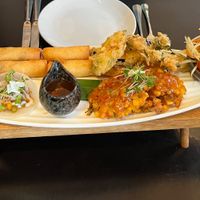 Banquet selection of starters incl sweetcorn fritters, spring rolls, tempura, vegan chicken tacos, papaya salad  at Chaophraya in Glasgow