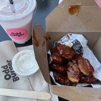 Bbq wings and strawberry shake   at Odd Burger in Vancouver