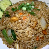 Tom Yum Fried Rice: Tofu, Lemongrass, Carrots, Onions, Scallions, Bean Sprouts, Kaffir Lime Leaves, Thai Basil in signature Tangy-Spicy Sauce at Thai Table in Grand Rapids