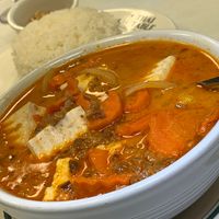 Massaman Curry: Onions, Potatoes, Carrots, Roasted Peanuts in House Peanut Curry, add Tofu at Thai Table in Grand Rapids