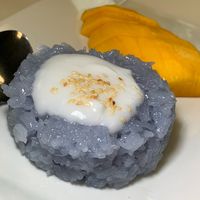 Mango & Sticky Rice with Butterfly Pea Flower & Coconut Milk at Thai Table in Grand Rapids