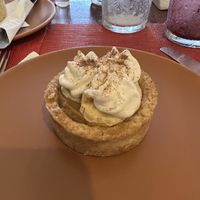 Bouffe de banana com doce de leite de soja, chantilly vegetal e canela  at Rango Vegan in Salvador