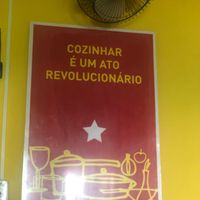 Sign in the restaurant -- Cooking is a revolutionary act.  at Rango Vegan in Salvador