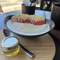 Breakfast oats with honeyy   at Ground Art Caffe in Cape Town
