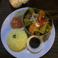 Vegetable amok with fresh green pepper  at Khouch & Sarin in Kampot