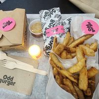 Tacos, fries, honey mustard & chick'un wings at Odd Burger - Church St in Toronto