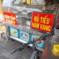 Signs on the pavement kitchen at An Dong in Ho Chi Minh City