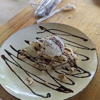 Vegan Crepes - coconut ice cream, cashew nuts, banana and chocolate sauce. at Lemons and Tomatoes in San Vicente Palawan