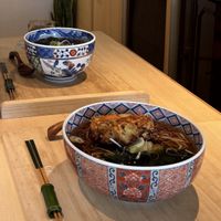 Hot soba with yellow tempura  at Vegan Soba Tokyo Ayler in Tokyo