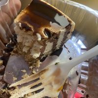 Vegan cheesecake with chocolate drizzle  at Bombay Food Junkies in St Louis