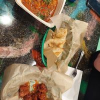 Butter chickn, wings w/ mango habenero sauce, samosas at Bombay Food Junkies in St Louis