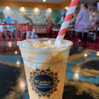 Peach Oatly milkshake with vegan whipped cream  at Bombay Food Junkies in St Louis