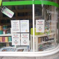 Posters downplaying covid-19 at Tofulino in Winterthur