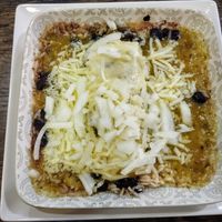 Enchilada con salsa verde at La Chaparrita in Sevilla